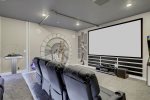 The whole family will love watching movies together in this custom theater